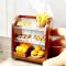 Handcrafted miniature bakery display with assorted breads, donuts, and pastries, perfect for dollhouse or diorama settings.