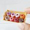 Miniature donuts in assorted designs, perfect for 1:12 scale dollhouse kitchens or bakery displays, handcrafted polymer clay food decor.