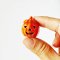 miniature ceramic Jack-O'-Lantern pumpkin jar with a removable lid