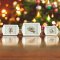 Miniature ceramic trays with Christmas designs of deer, lantern, and bunny, ideal for dollhouse holiday decor in 1:12 scale.