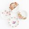 Miniature ceramic plates featuring pastel flower patterns, ideal for dollhouse kitchens, tea sets, or elegant wall decor.