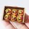 Miniature Assorted Fruit Pastries on Wooden Tray