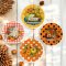 Handcrafted miniature ceramic plates featuring charming autumn pumpkin-themed designs with gingham and polka dots, perfect for dollhouse decor.