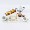 Miniature tea and pastry set with chocolates for 1:12 scale dollhouse decor. Perfect for tea parties and kitchen scenes.