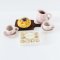 Miniature tea and pastry set with chocolates for 1:12 scale dollhouse decor. Perfect for tea parties and kitchen scenes.