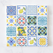 Handcrafted miniature ceramic tiles with lemon and floral patterns, ideal for 1:12 scale dollhouse decor. Set includes 16 vibrant 1.5 cm tiles.