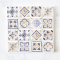 Handcrafted miniature ceramic tiles featuring elegant blue, gold, and neutral patterns. Perfect for 1:12 scale dollhouse decor. Set of 16 tiles.