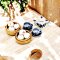 Miniature dim sum set with floral teapot and cups for 1:12 scale dollhouse decor.