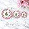 Miniature Christmas plates with red and green tree designs, set of 3. Perfect for dollhouse holiday decor or festive miniature table settings.