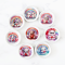 Set of nine miniature ceramic plates featuring adorable animals and rainbow designs, perfect for dollhouse decor or collectible gifts.