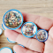 Set of three miniature ceramic plates with Easter gnome designs, featuring colorful eggs and floral details, perfect for dollhouse spring decor