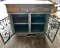 Blue Sideboard with Wrought Iron Decor