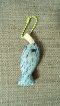 blue fish keychain, green cord
