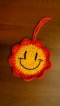 Crochet coaster, orange flowers