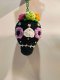 Black skull keychain with purple eye
