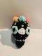 Black skull keychain with blue eye