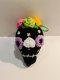 Black skull keychain with purple eye