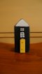 Wooden house with yellow door (Black)