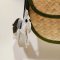 White horse keychain with a light blue tail