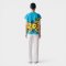 เสื้อตัวหลวมผู้หญิง - สีฟ้า : ลายเจ้าปั๊กในสวนเหลือง