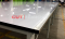 โต๊ะตัดผ้าชนิดธรรมดา หน้าไม้เคลือบแผ่นโฟเมก้า-ขาว, ขอบStainless Model :TM-01Fs