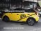 Yellow MG3 decorated around the car.