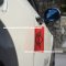 Mini car door tag, mini wings logo pattern, red background