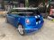 Mini Cooper S, blue, decorated with stickers.