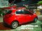 Mazda2 5ประตูสีแดงคาดเส้นข้างสไตล์ Racing