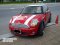 Mini Cooper สีแดงคาดเส้นคู่ขาวเงาลายคลาสสิค